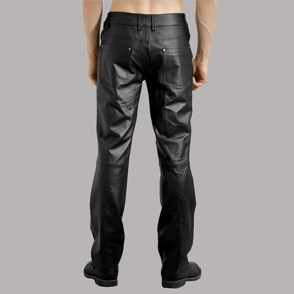 Rear view of a model wearing slim fit black leather motorcycle trousers highlighting the fit and pockets.