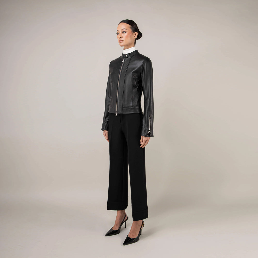 Full-body angled view of women’s Nappa leather café racer jacket in oil black