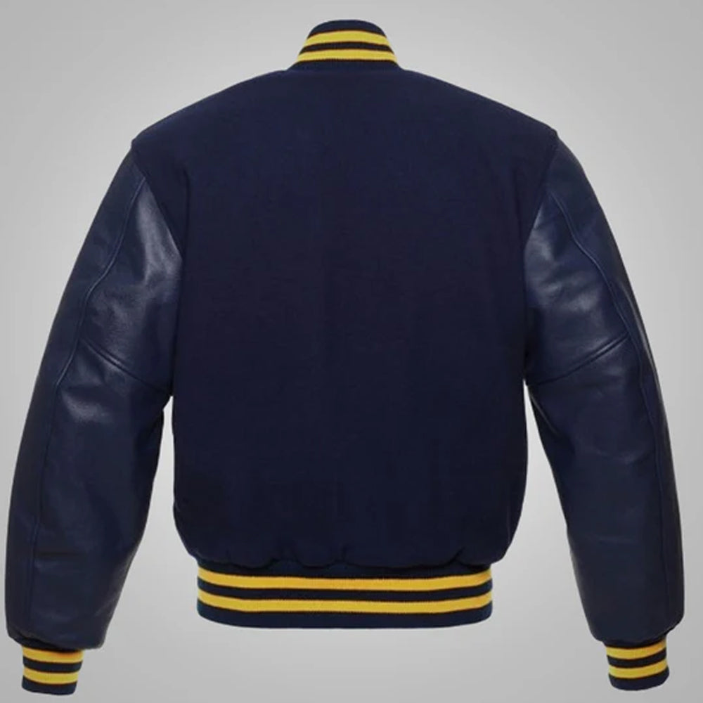 The clean back view of the navy blue letterman jacket highlighting the premium striped yellow and navy rib-knitted collar and waist hem.