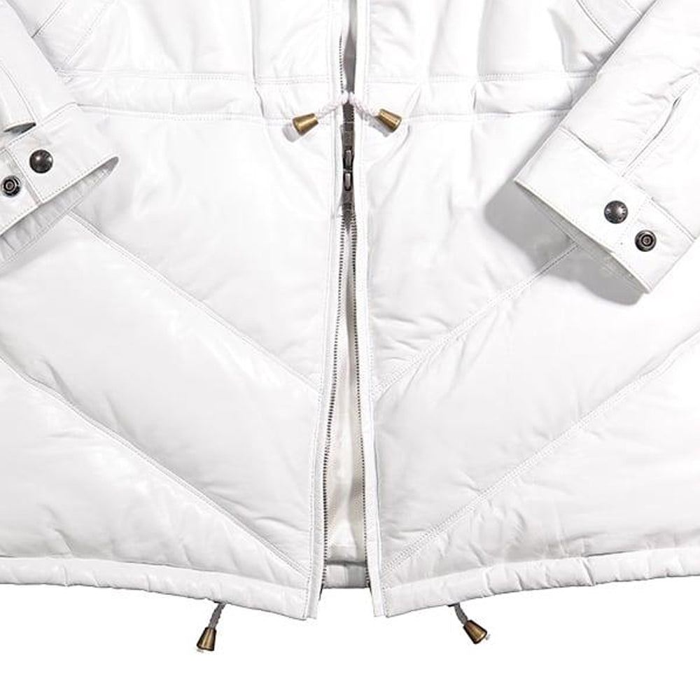 Close-up of off-white leather coat hem with brass-tipped drawcords and YKK zipper