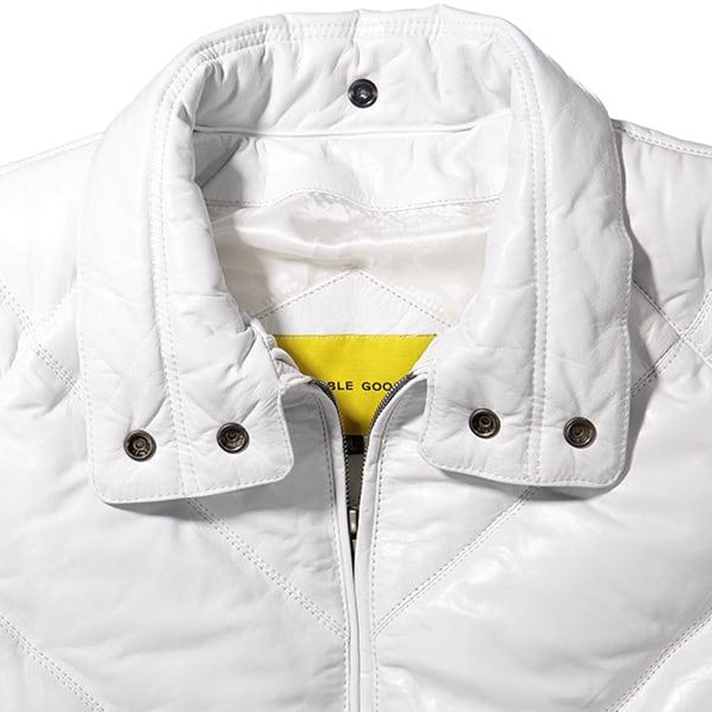 Close-up of off-white leather coat collar with snap closures and Double Goose brand tab