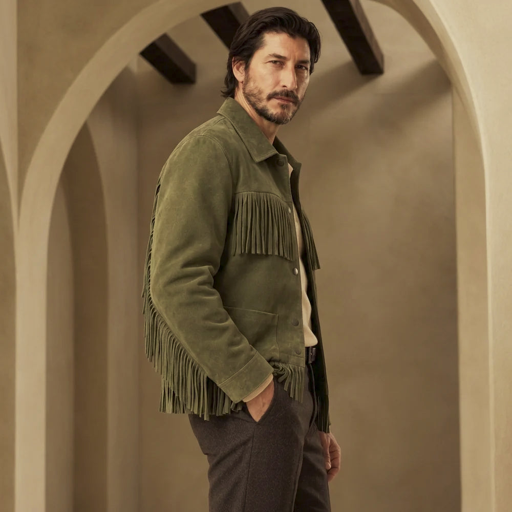 Profile view of olive rodeo fringe jacket with brushed suede texture, open patch pocket and moving waist fringe.