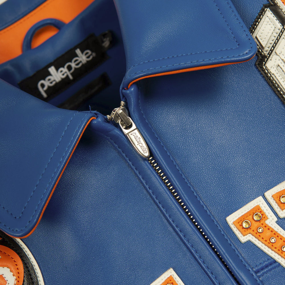 Pelle Pelle branded metal zipper pull with orange-edged royal blue leather collar