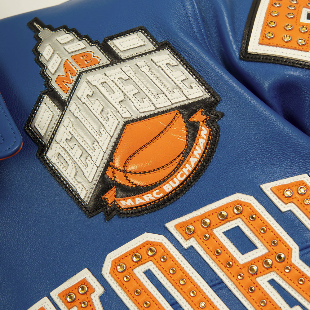 Layered Pelle Pelle New York chest crest with basketball and Marc Buchanan detailing
