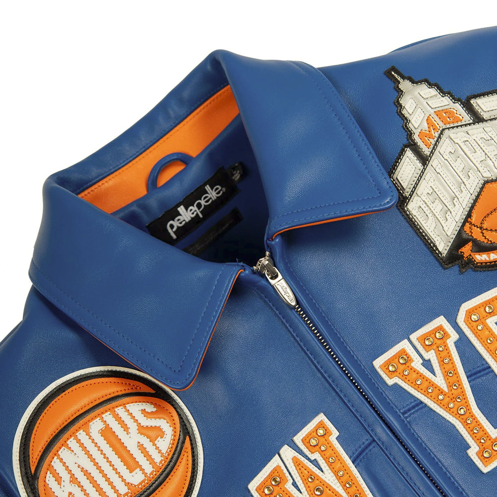 Royal blue Pelle Pelle jacket upper front with Knicks patch, New York lettering and branded crest