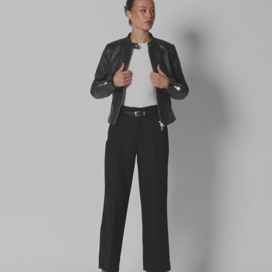 Women’s oil-black Nappa lambskin café racer jacket shown from multiple angles, highlighting its tailored silhouette, snap collar, center zipper, zip cuffs and sculpted back.