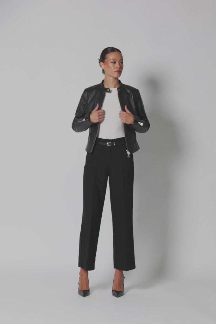 Women’s oil-black Nappa lambskin café racer jacket shown from multiple angles, highlighting its tailored silhouette, snap collar, center zipper, zip cuffs and sculpted back.