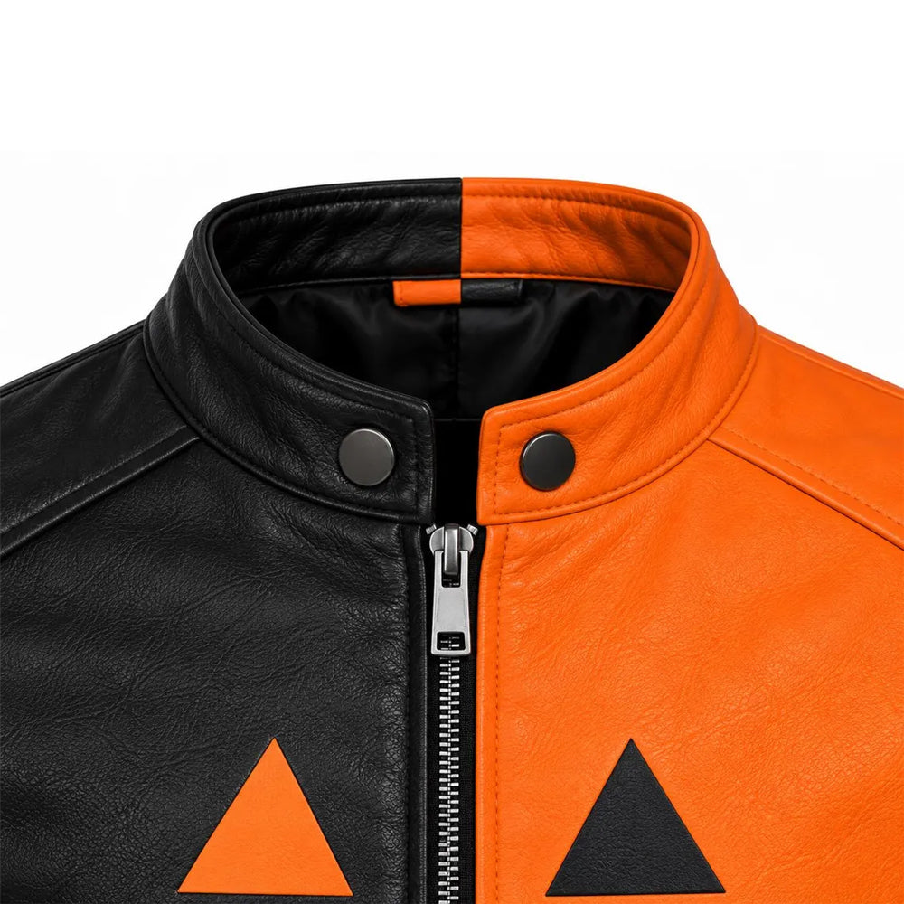 Close-up of black and orange snap-tab collar with metal front zipper