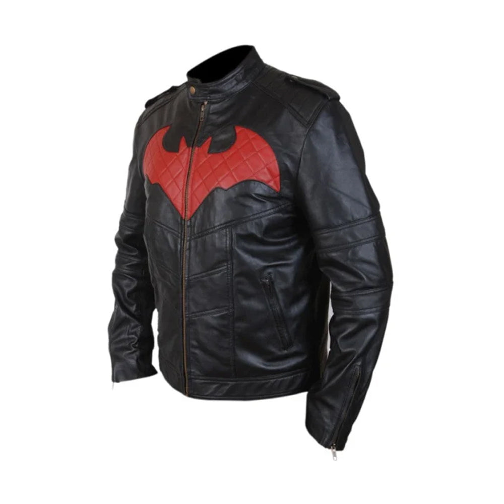 Angled view of superhero-inspired lambskin jacket with epaulette, zip cuff and quilted red emblem