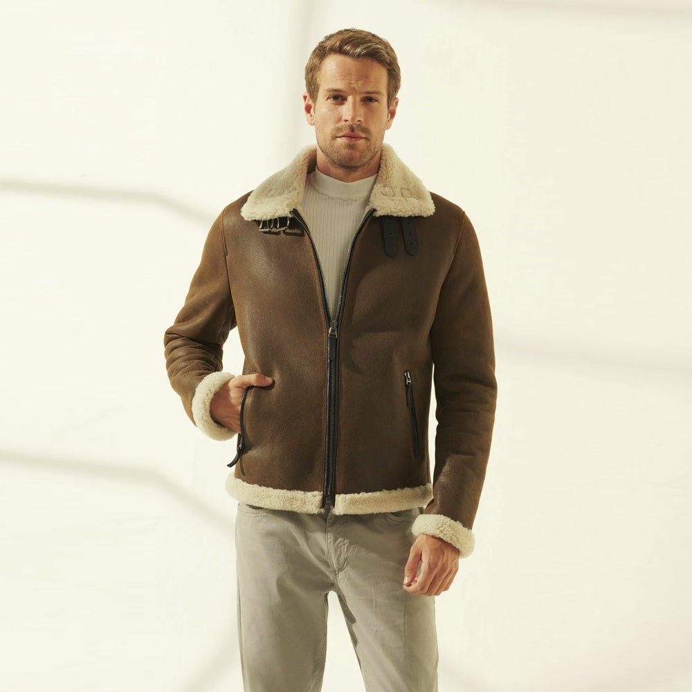 Front view of a men’s vintage brown sheepskin aviator jacket with ivory shearling collar, buckle tabs and two-way zipper