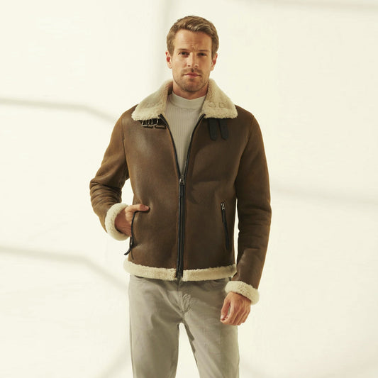 Front view of a men’s vintage brown sheepskin aviator jacket with ivory shearling collar, buckle tabs and two-way zipper