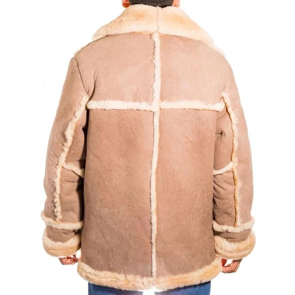 Back view of beige sheepskin Western Shearling Coat showing patchwork trim panels and cross-stitch yoke detail
