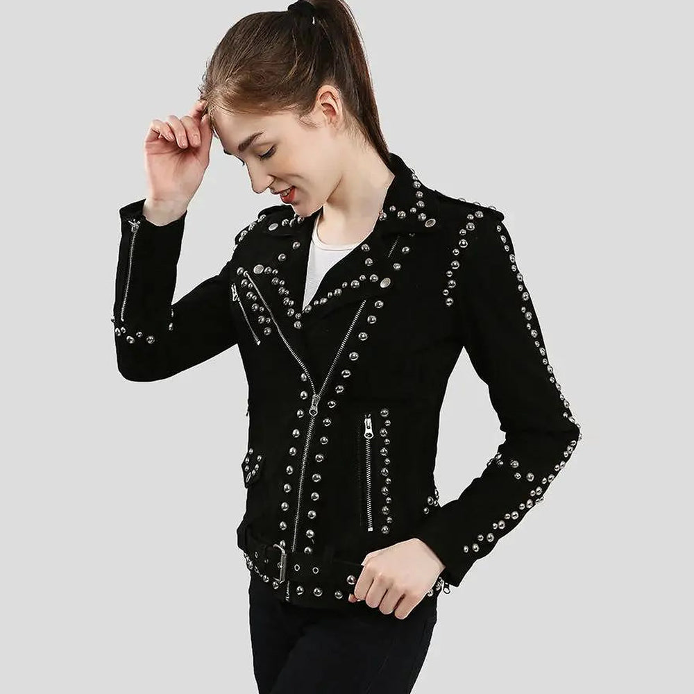 Angled view of women’s black studded suede moto jacket