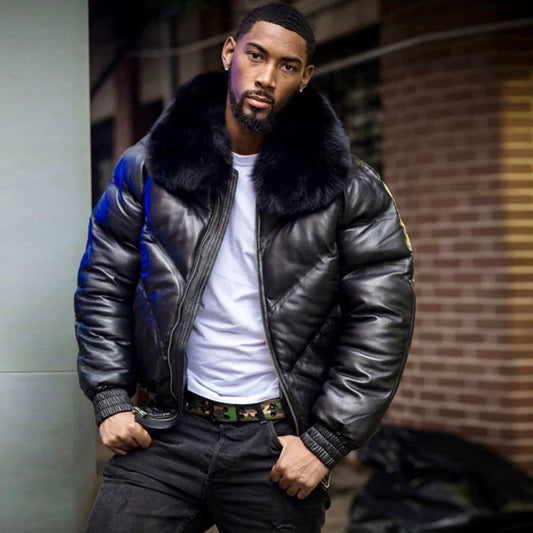 A model standing in the street wearing the all-black sheepskin leather V-bomber down puffer coat open.