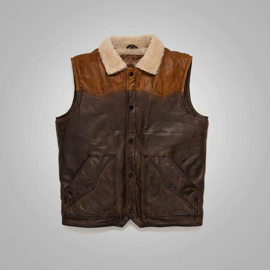 Front view of the men's brown nappa shearling leather cowboy vest featuring an asymmetrical silver zipper track.