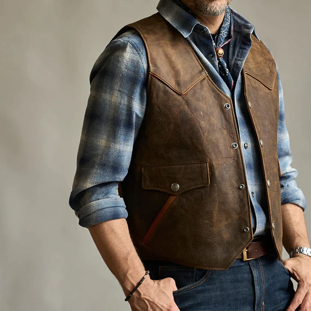 Lifestyle display of a man wearing the distressed tobacco brown leather riding waistcoat showing the fit.