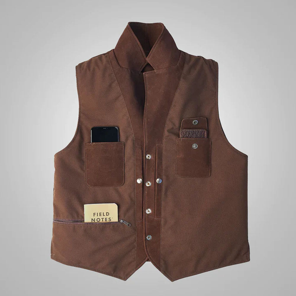 Reversed view of the tactical leather cargo vest showcasing the alternative black utility side with pockets.