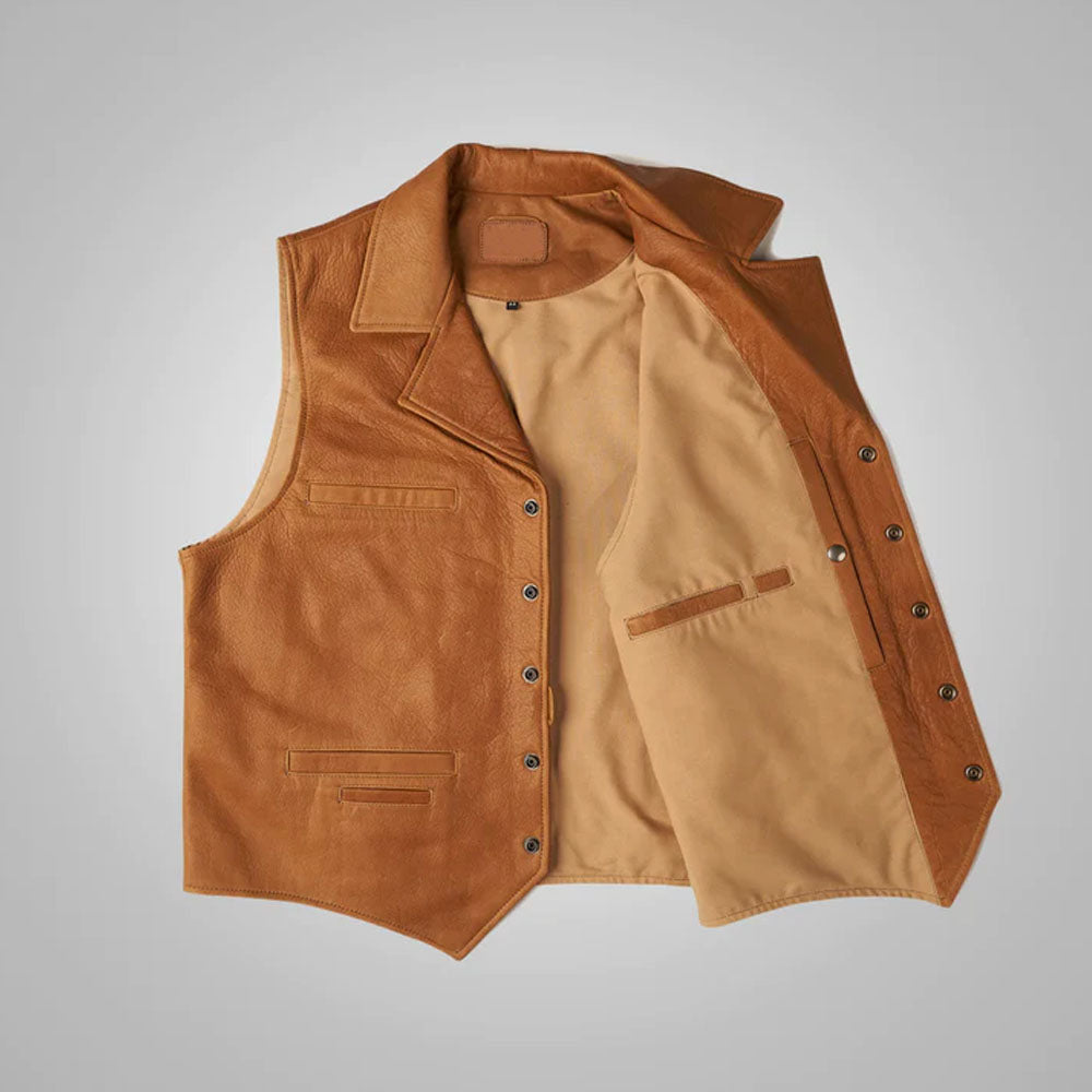 Open view of the tobacco brown leather cowboy vest displaying the smooth dark chocolate interior lining.
